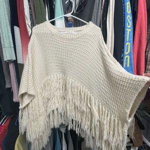 Cream color fringe poncho sweater